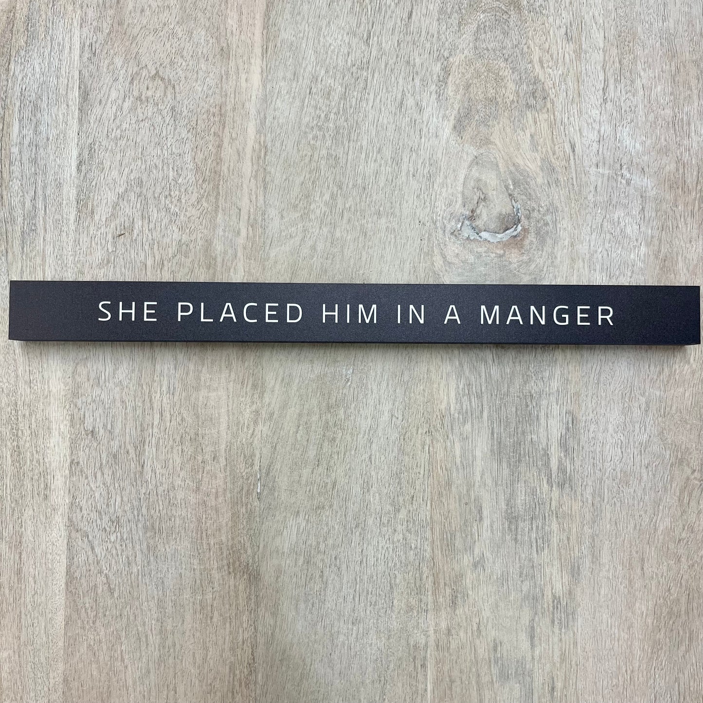 She Placed Him In A Manger