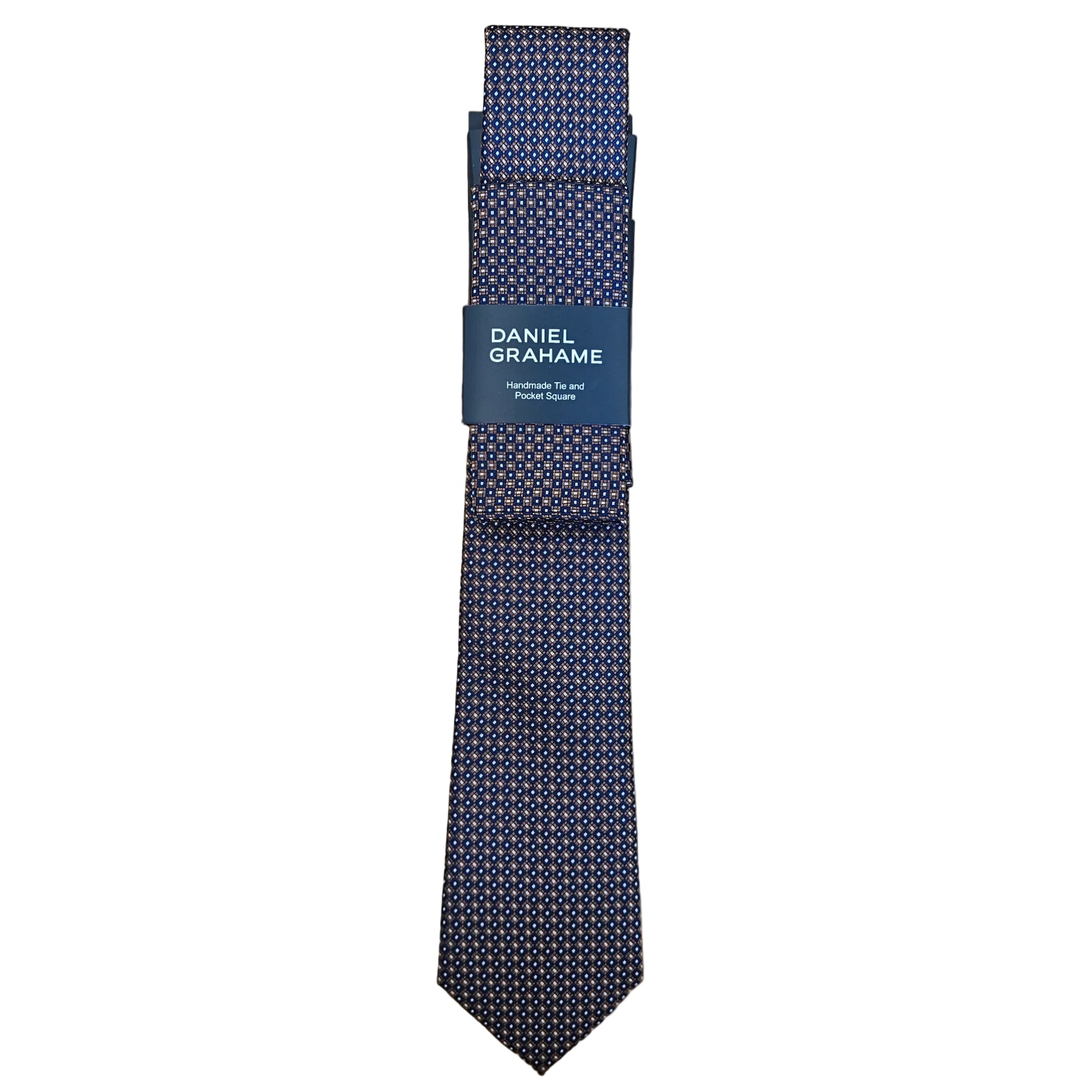 A folded Daniel Grahame necktie with a navy blue base and a dense micro-pattern of small white and gold dots, displayed on a white background.