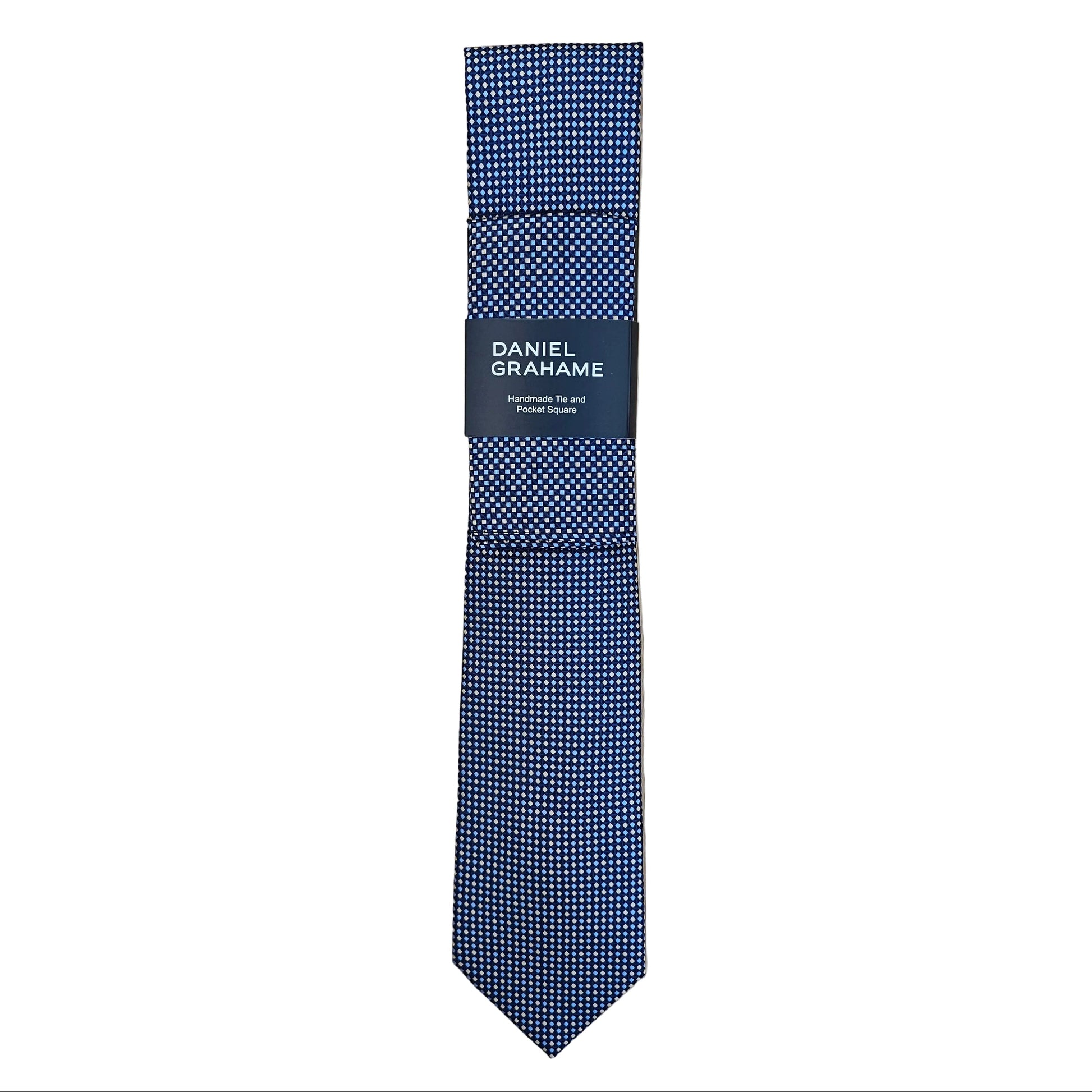 A blue and pale blue micro-check pattern necktie with a black paper band label that reads 'Daniel Grahame'.
