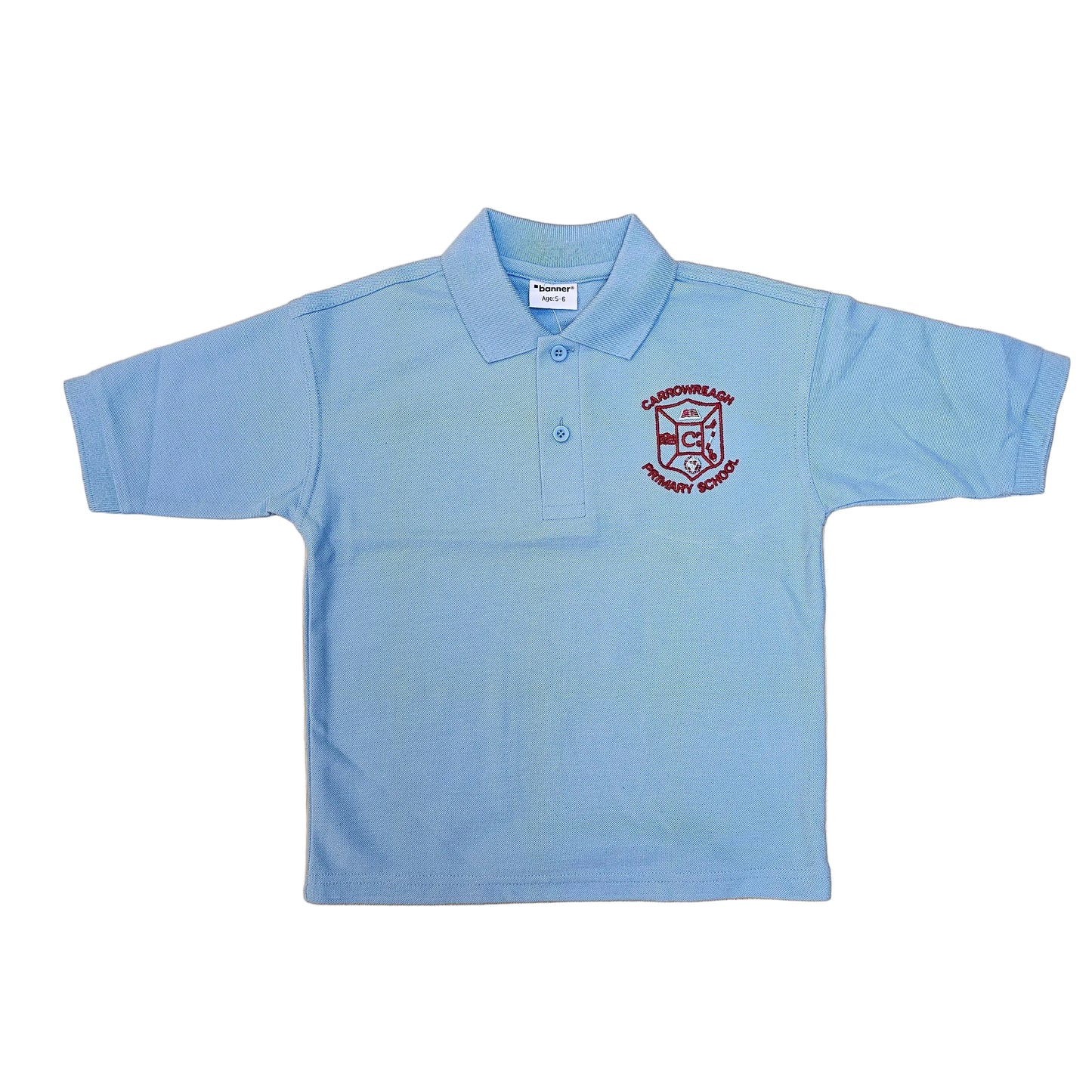 A light blue short-sleeve polo shirt with a red embroidered school crest on the left chest, laid flat on a light wood grain surface.